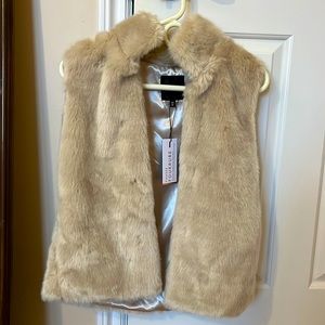 Never worn, faux fur vest